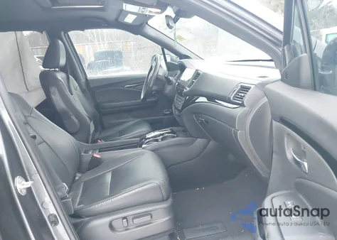 2019 Honda Passport Elite z USA, uszkodzony, nr VIN 5FNYF8H04KB005095